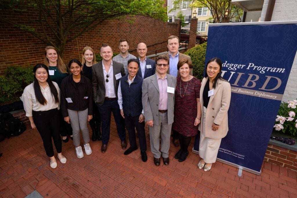 IBD alumni pose at end of year event